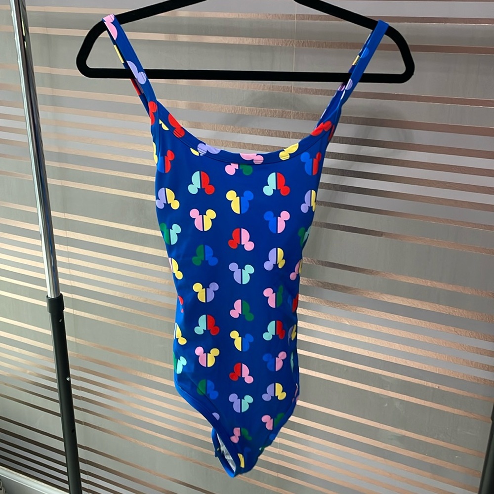 Women’s size medium Hanna Anderson Disney Swimsuit. Never worn fits  6/8